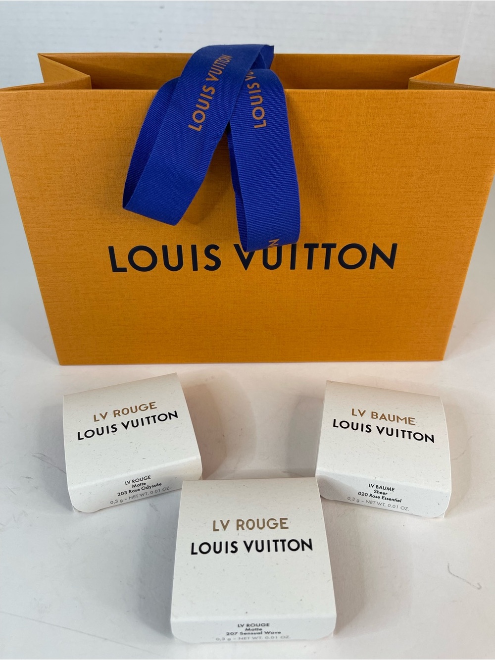 Louis Vuitton gift bag with three lipstick samples